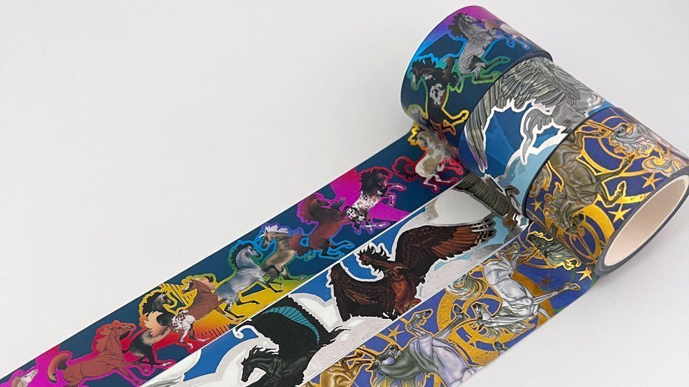 Custom washi tape rolls standing upright showing colorful full-color and foil printed designs