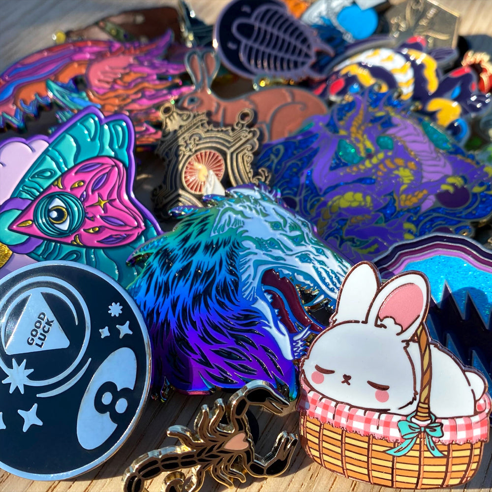 Alchemy Merch - Custom enamel pins - soft enamel, hard enamel, rainbow andm ore.