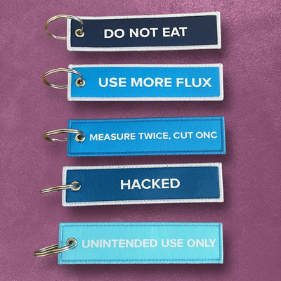 Custom Patch Keychains — color and finish variations